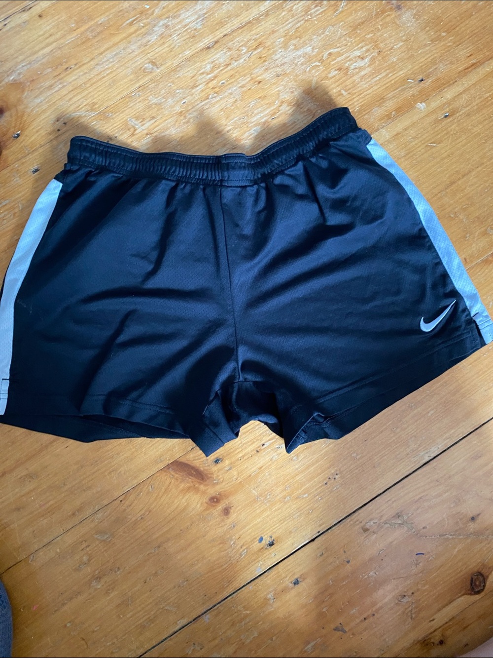 Nike Women's Black Athletic Shorts with Gray Side Panels great condition size M